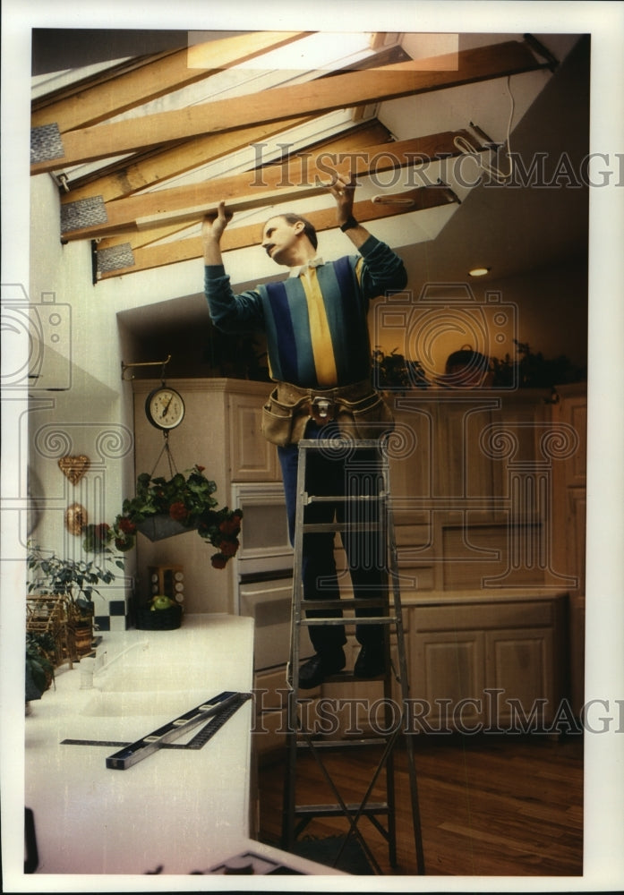 1993 Milwaukee, Wisconsin, Harry Pollock remodeling his kitchern - Historic Images