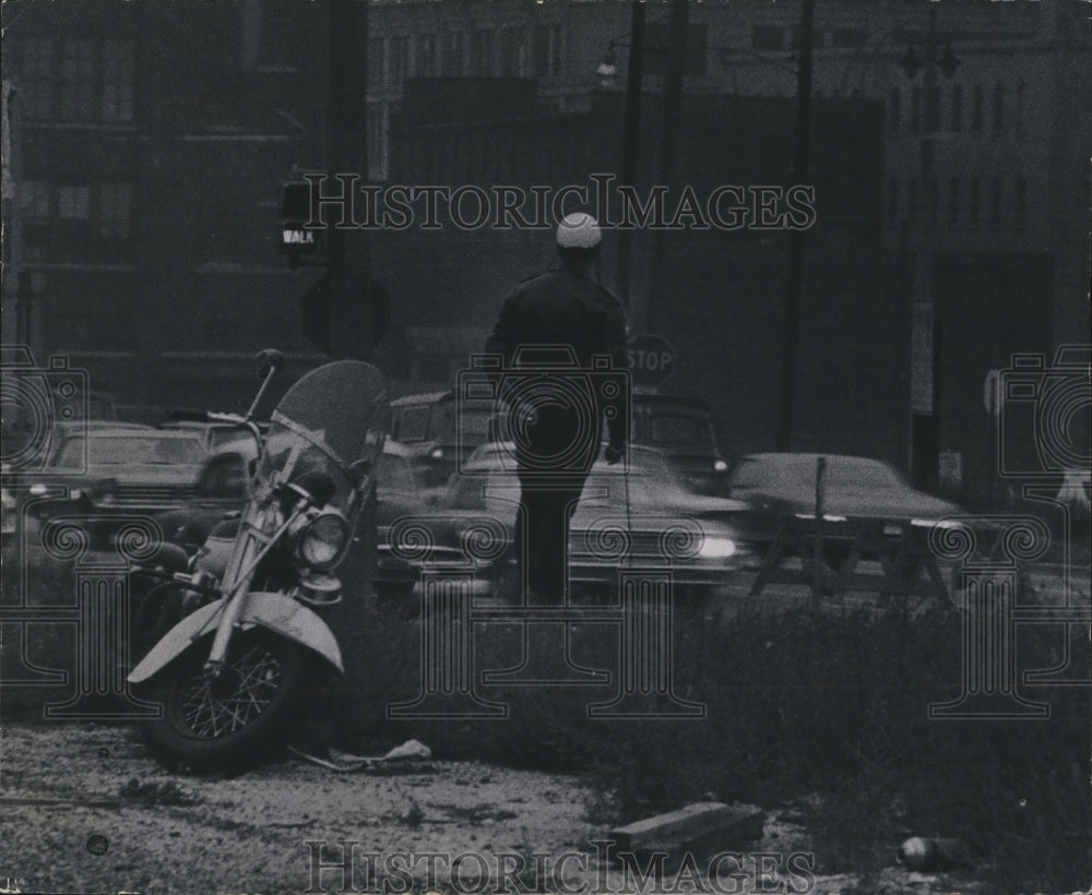 1965 Dale Matteson Milwaukee Police Officer controls traffic - Historic Images