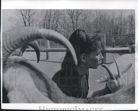 1972 Mrs. Fischer surrounded by animals at Milwaukee children's zoo - Historic Images