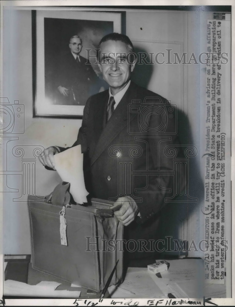 1951 Press Photo Averell Harriman packs brief case for trip to Iran, Washington. - Historic Images