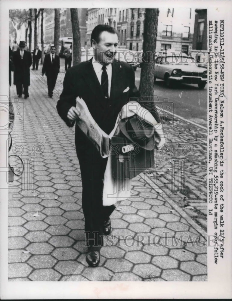 1958 Nelson A. Rockefeller, New York, walks after winning election - Historic Images