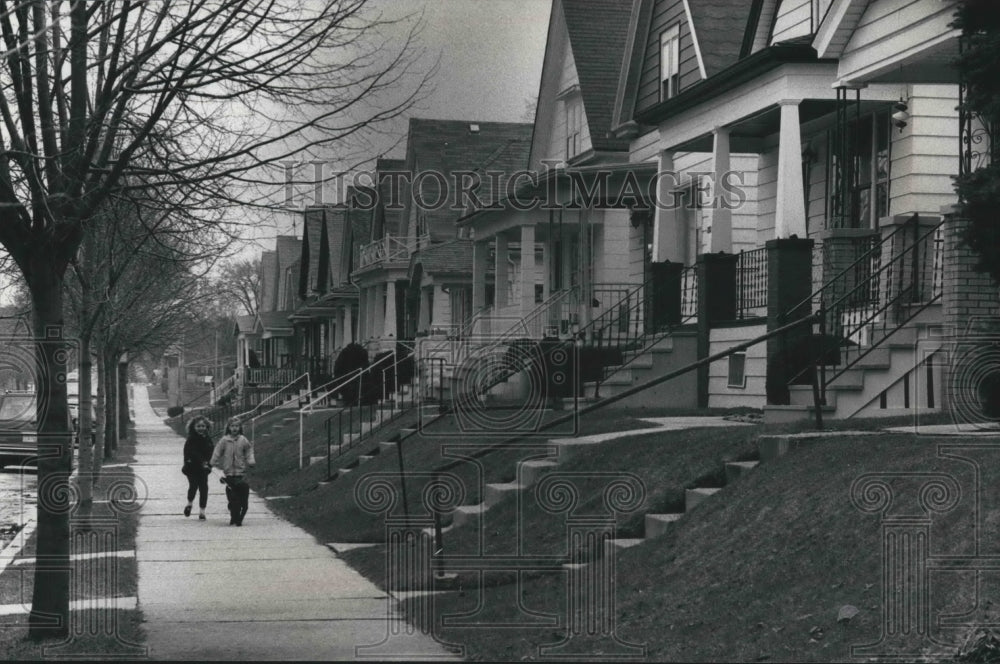 1990 Gina Becker and Kate Burkman walking dog, South Side Milwaukee-Historic Images