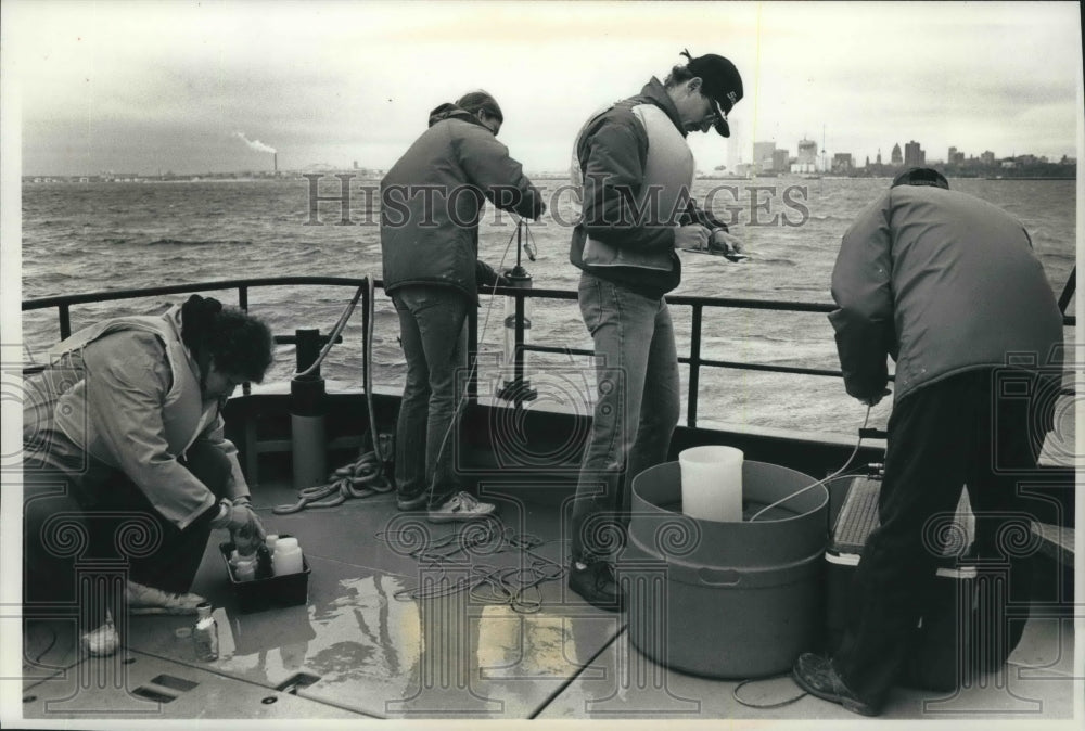 1989 Water samples being collected for testing, Milwaukee-Historic Images