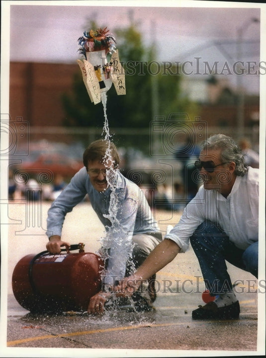 1993 Two Milwaukee school teachers launch a student's water rocket.-Historic Images