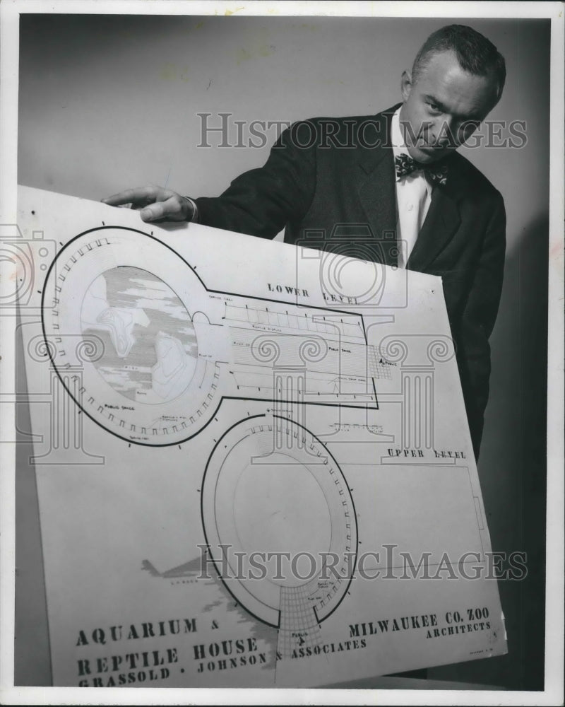 1956 Press Photo John W. Allis shows plans for new Milwaukee Zoo aquarium - Historic Images