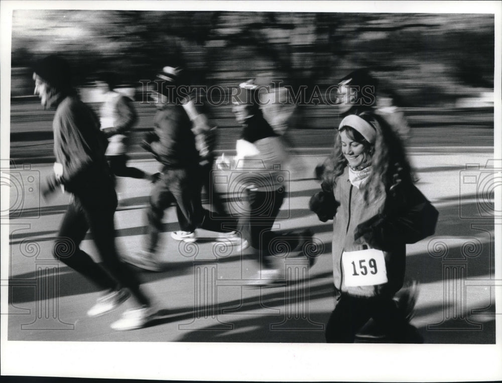 1993 Runners are a blur at Champagne Chase on New Years Day Hartland - Historic Images