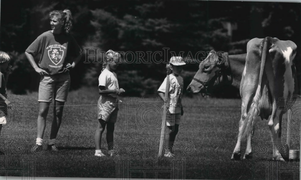 1991 Great Cow Maneuver with "Bestiny" at dedication of soccer field - Historic Images