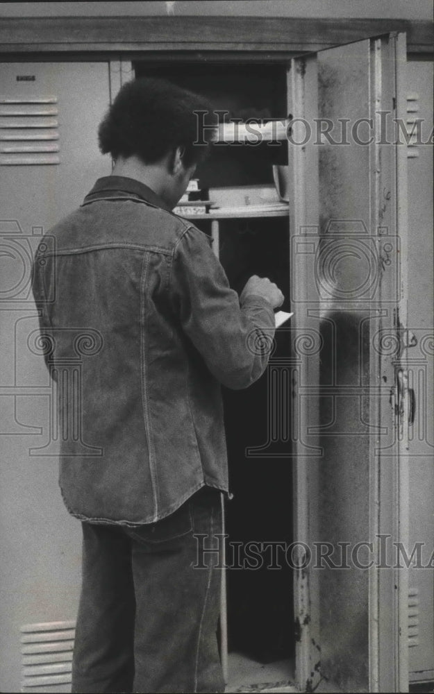 1976 Rufus Junior High Student at his locker, Milwaukee-Historic Images