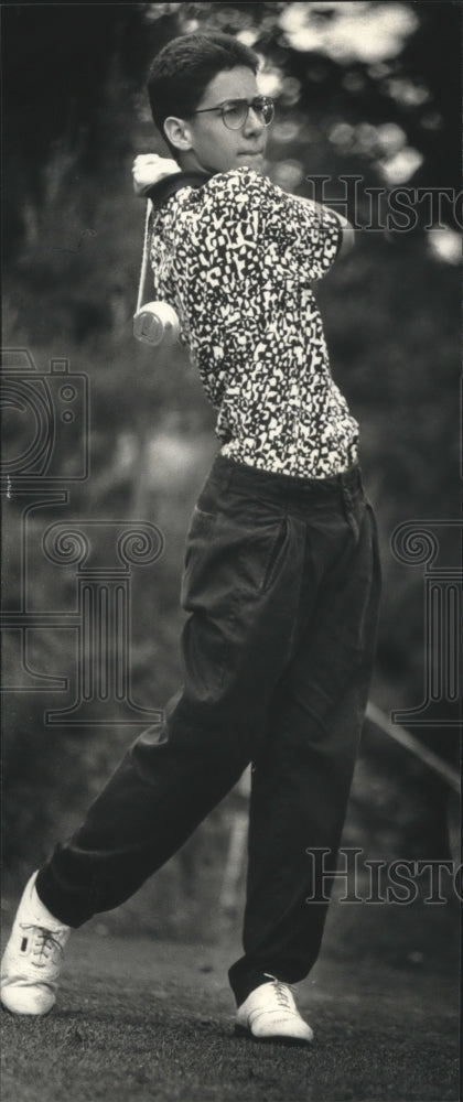 1992 Carter Johnson golfs at tournament at Kettle Moraine Club - Historic Images
