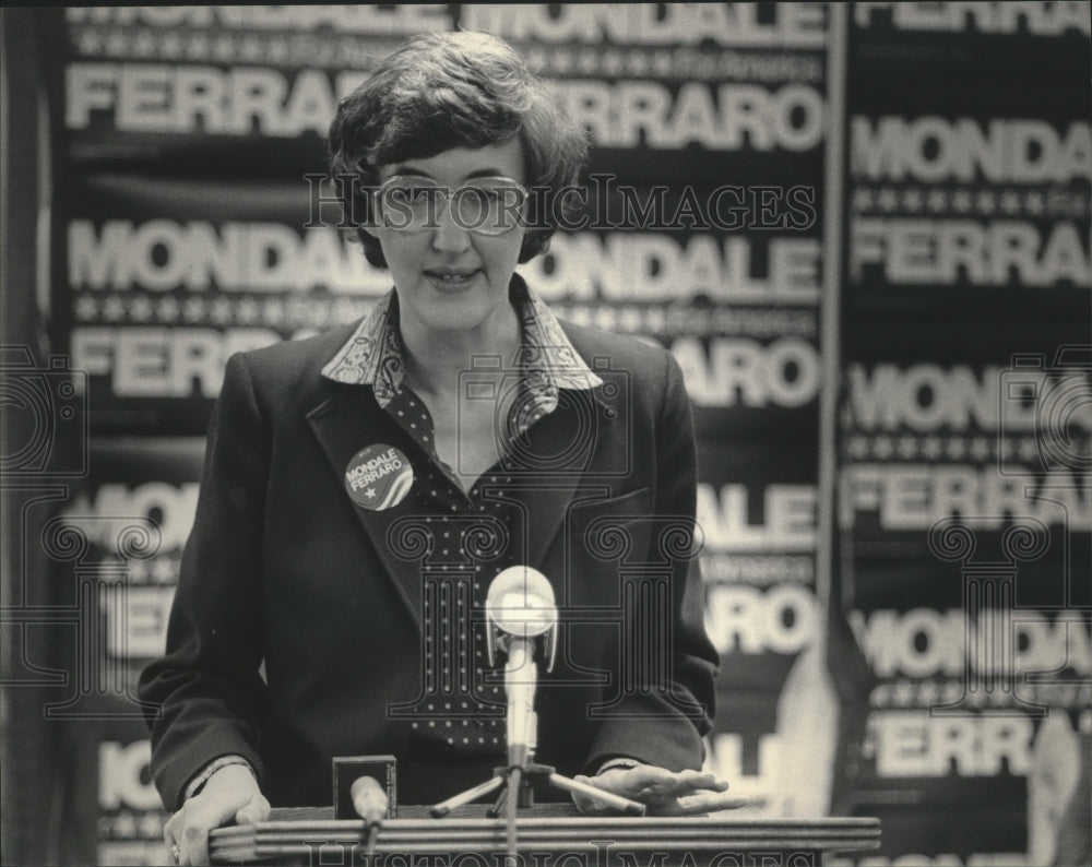 1984 Judy Goldsmith stands in front of Mondale/Ferrero poster - Historic Images