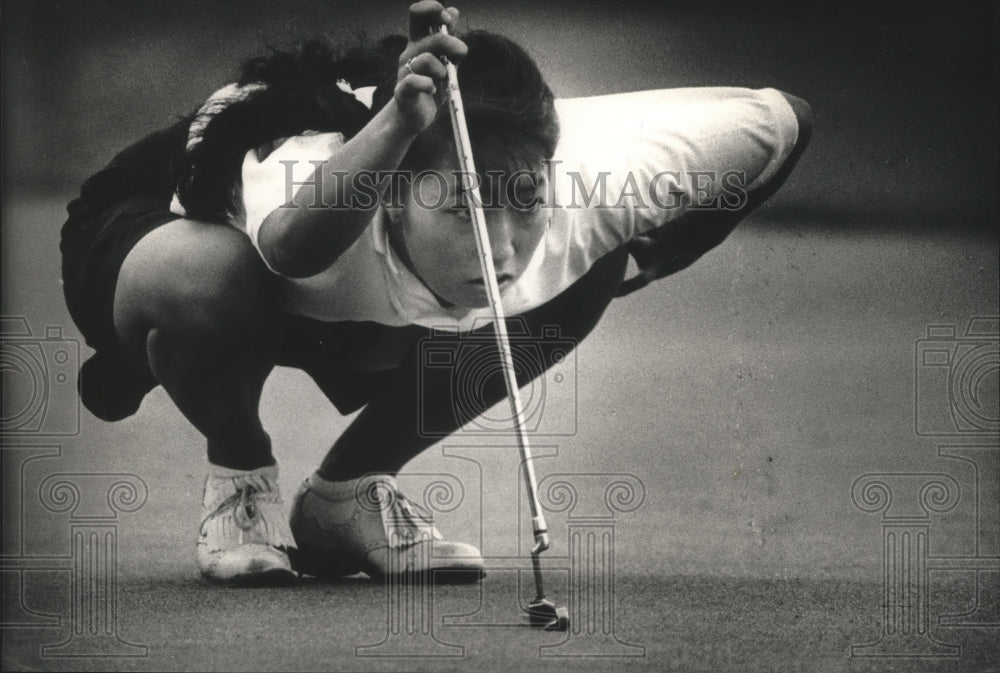 1988 Chika Tagawa lines up putt, Junior Girls Golf Championship-Historic Images