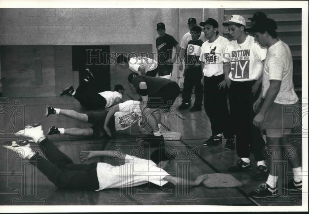 1992 Baseball Players Run Drills at Oconomowoc High School Wisconsin - Historic Images
