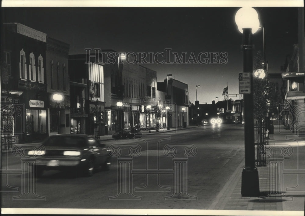 1988 Press Photo Downtown Oconomowoc on stormy night - mjb66695 - Historic Images