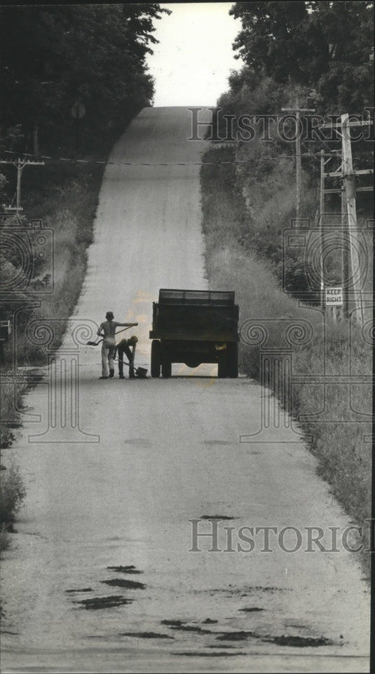 1982 Roger and Ryan Reedy Fill Potholes, Gresham, Wisconsin - Historic Images