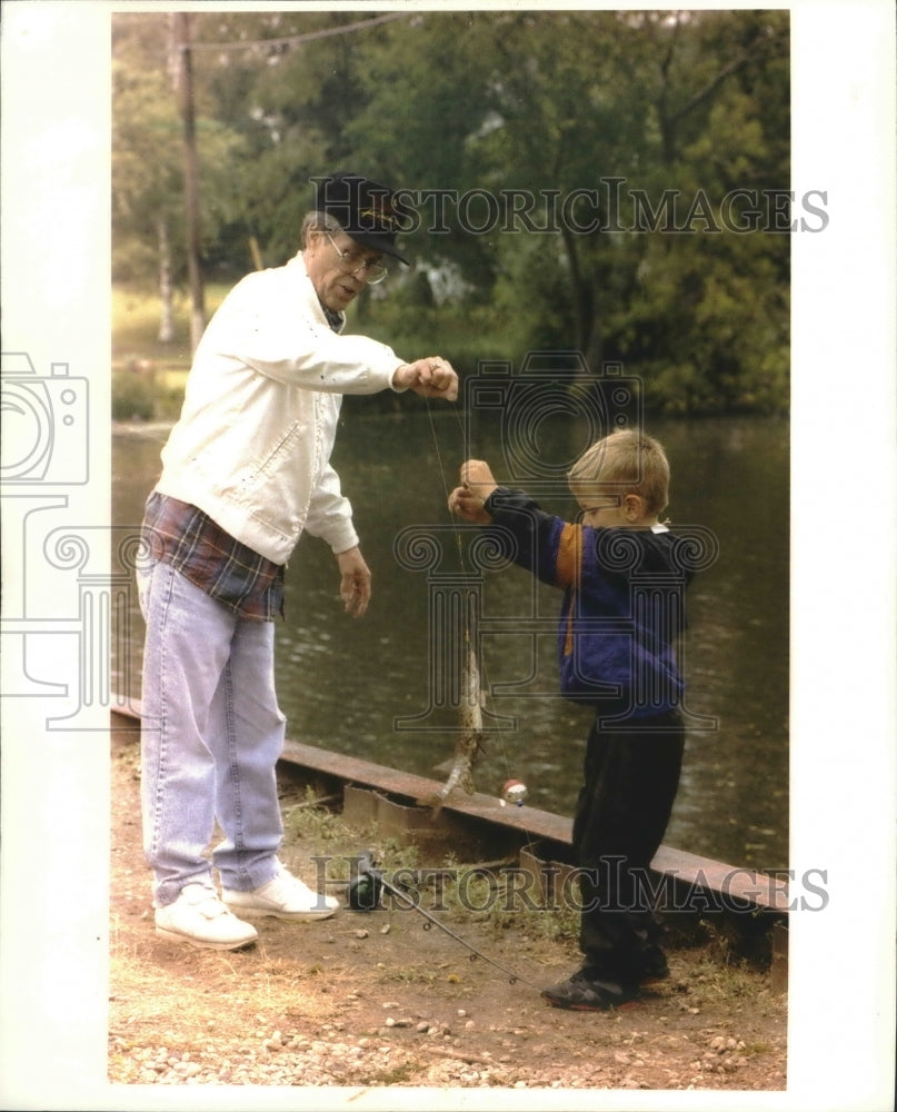 1994 Ryan Radke and grandmother Ron fishing, Oconomowoc, WI-Historic Images