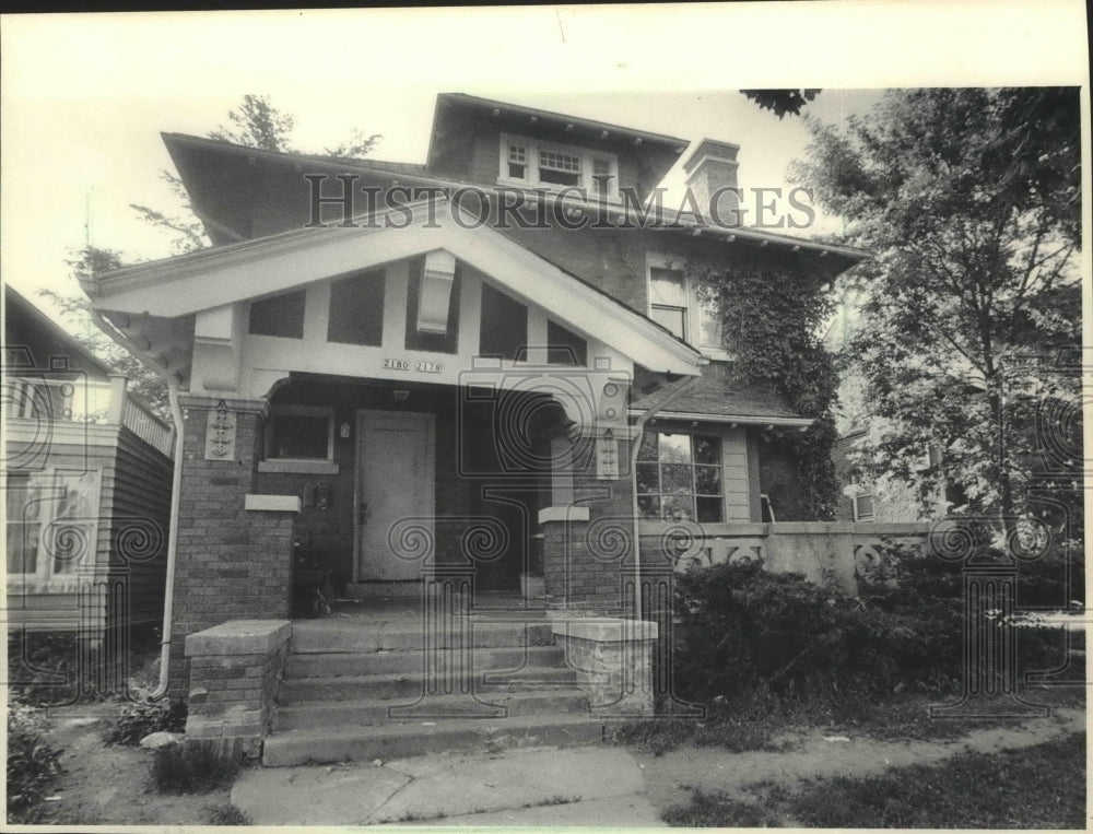 1985 Abandoned home with a lot of damage frustrates city, Milwaukee. - Historic Images