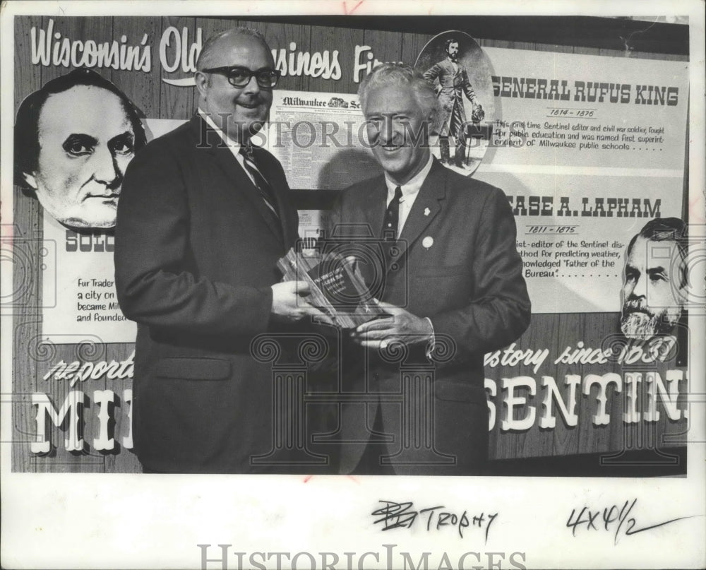 1968 Press Photo Joseph Flanagan accepting plaque from the governor, Milwaukee. - Historic Images