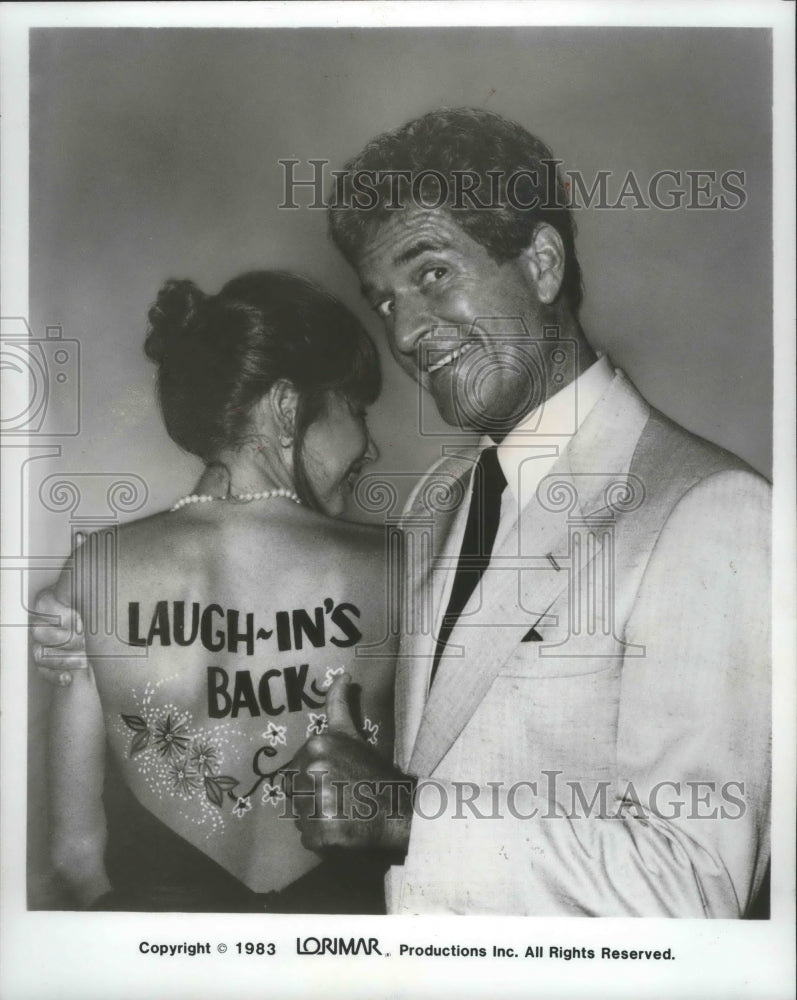 1986 Hugh O&#39;Brien shows &quot; Laugh-in&#39;s back&quot;  at reunion for cast. - Historic Images