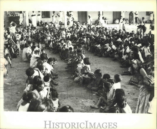 1978 Cyclone victims in India waiting for food allotment from CARE-Historic Images