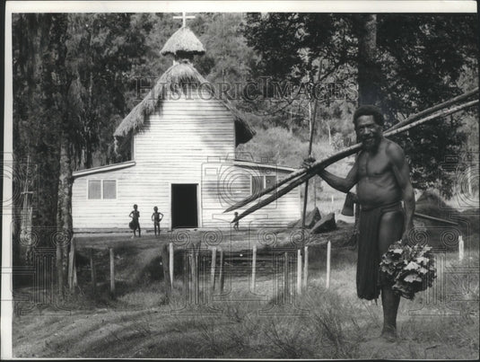 1976 Stone-age tribesmen pose near a church in Papua New Guinea-Historic Images