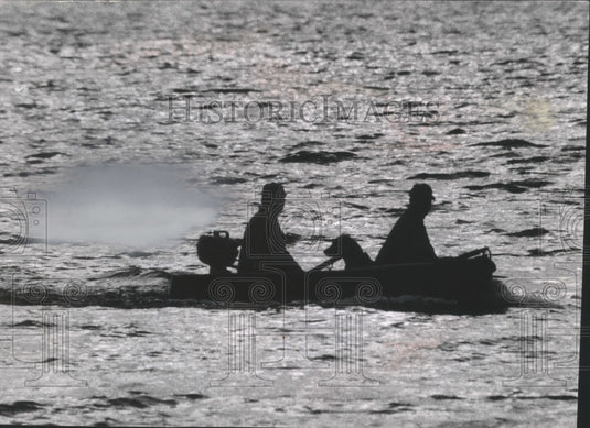 1969 Press Photo Two hunters and a dog head out in search of ducks in Wisconsin - Historic Images