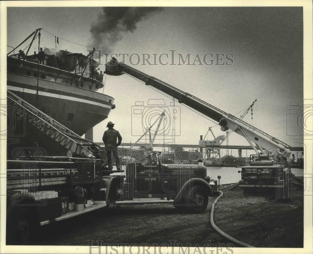 1980 Milwaukee firefighters fight blaze on an old ore ship-Historic Images