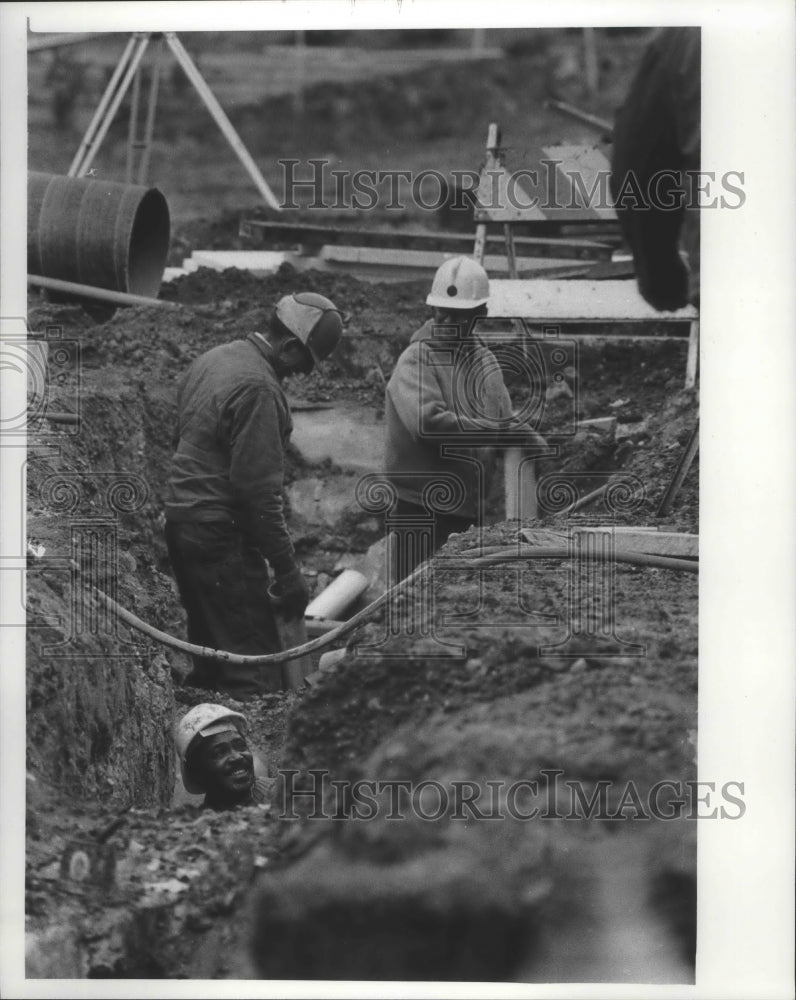 1976 Workers on Pere Marquette Park expansion. - Historic Images