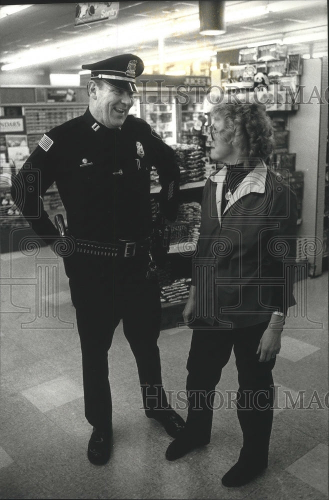 1989 Gordon Nell, Elm Grove's acting police chief in Village Mall - Historic Images