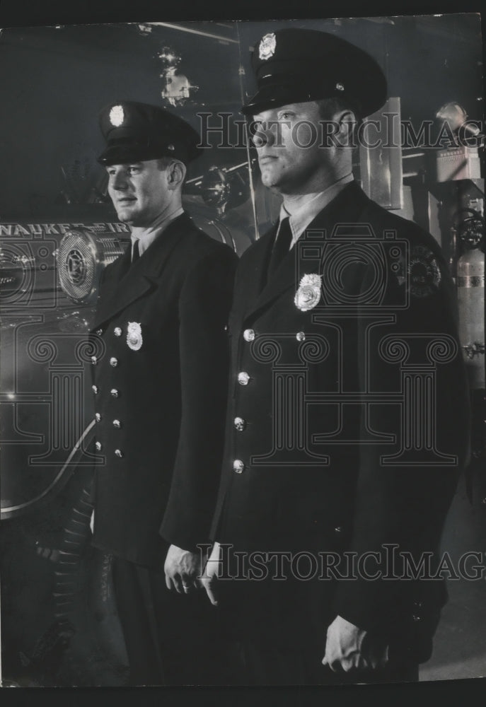 1960 Press Photo Milwaukee firemen modeling new and old uniforms - mjb70552 - Historic Images