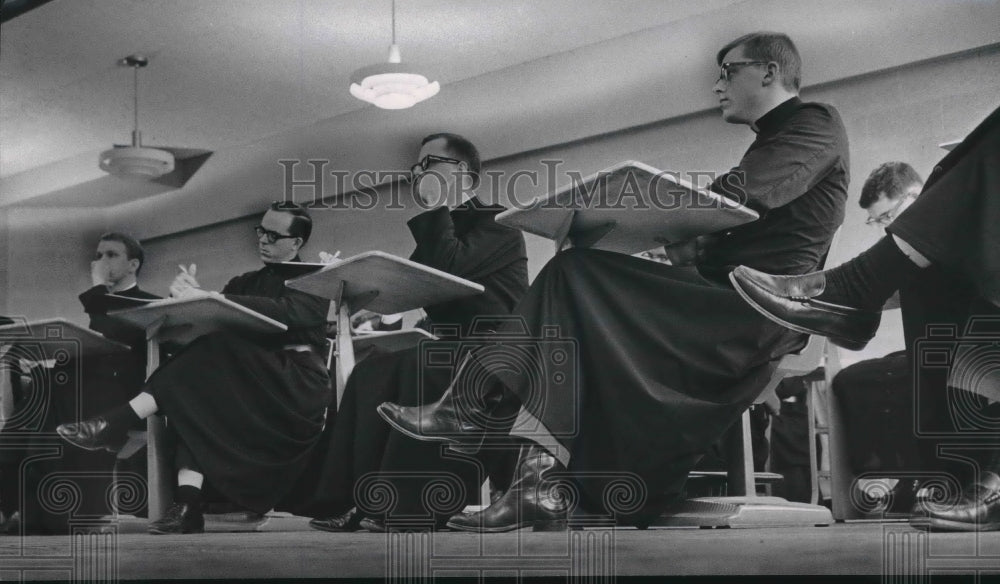 Priests sit in classroom setting-Historic Images