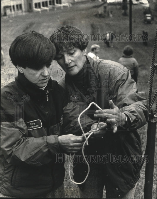 1990 National Ski patrollers Mary Bachman and Audrey Keck, work knot - Historic Images