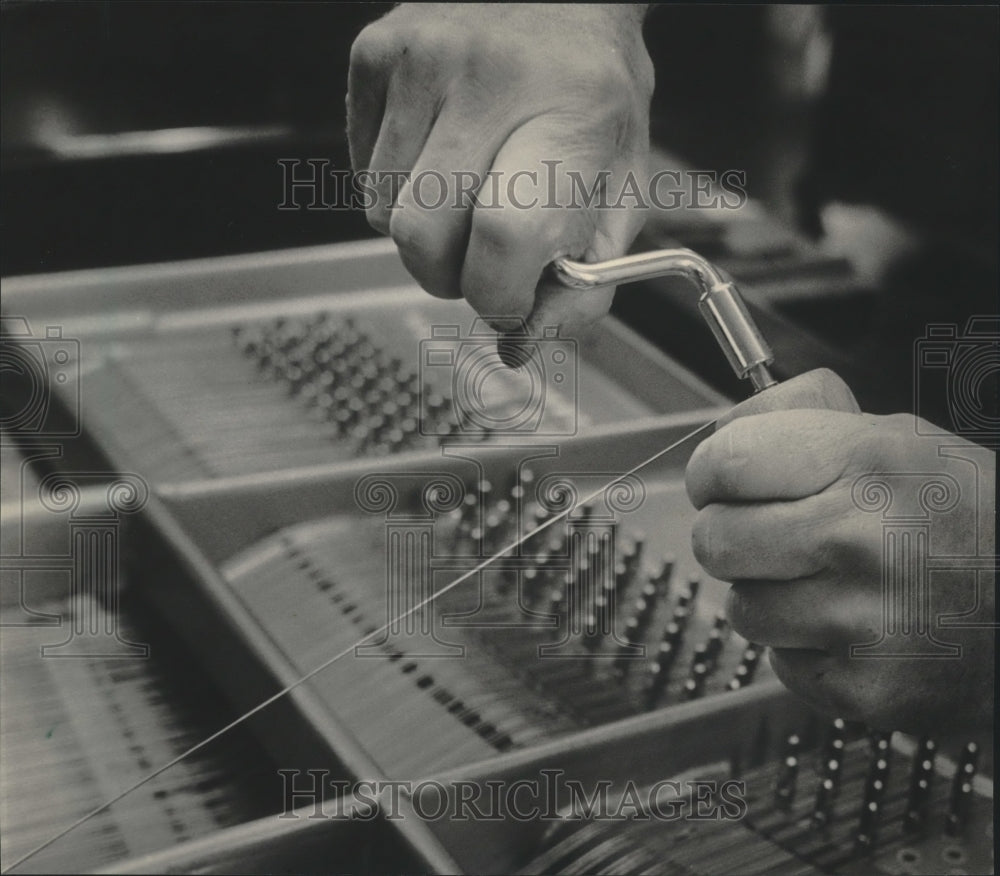 1984 Musical Instrumentals Keyboard being restrung Manitowoc - Historic Images