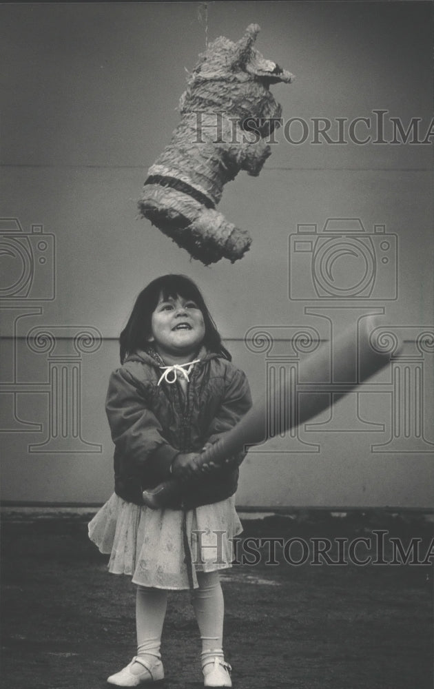1986 Yamilette Pettit tried to knock down a pinata-Historic Images