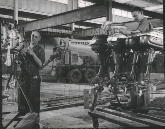 1954 Press Photo Joseph Lang inspects products at Evinrude Motors as it expands - Historic Images