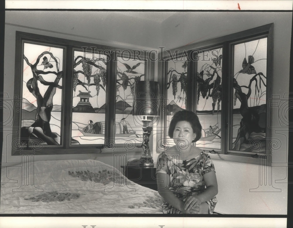 1991 Mai Ja Ngul: Racine home decorated with stained glass - Historic Images