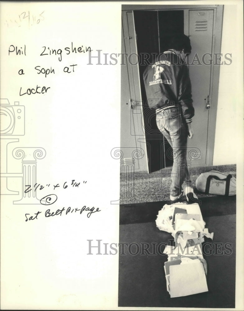1984 Messner High School Closing, student Phil Zingshein at locker-Historic Images