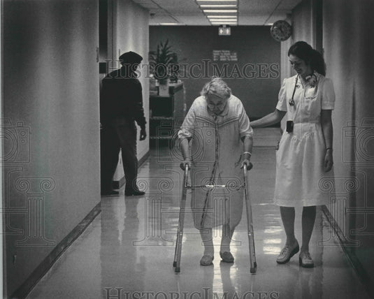 1984 Nurse Jane Russell helped Rose Tretow use a walker, Mount Sinai-Historic Images