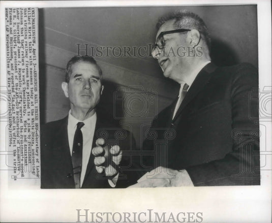 1966 Willard Wirtz and James J. Reynolds talk to reporters - Historic Images