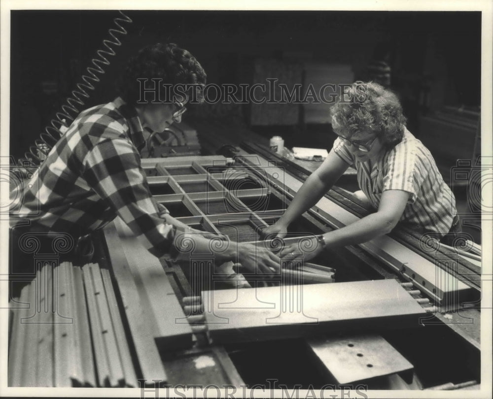 1987 Arlene Soukup (left) and Irma Rodenca at Morgan Products plant - Historic Images