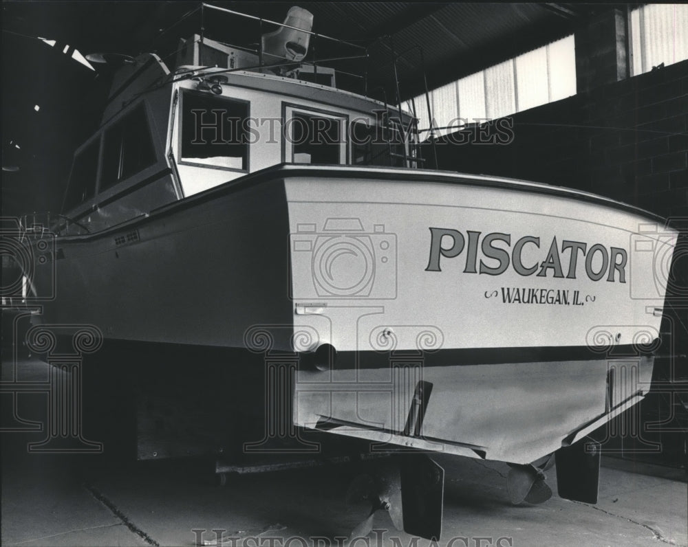 1985 The Piscator sits in storage after recovery,  it ran aground-Historic Images