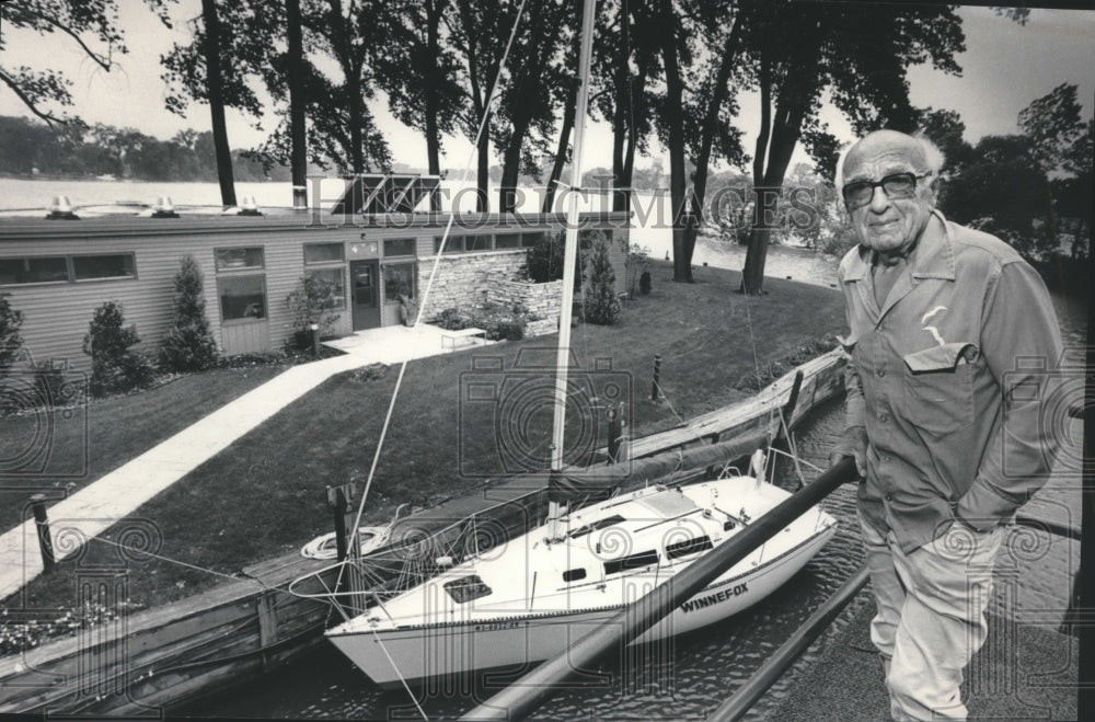 1983 Retired William Kellet at boathouse on Winterfox Point Menasha-Historic Images