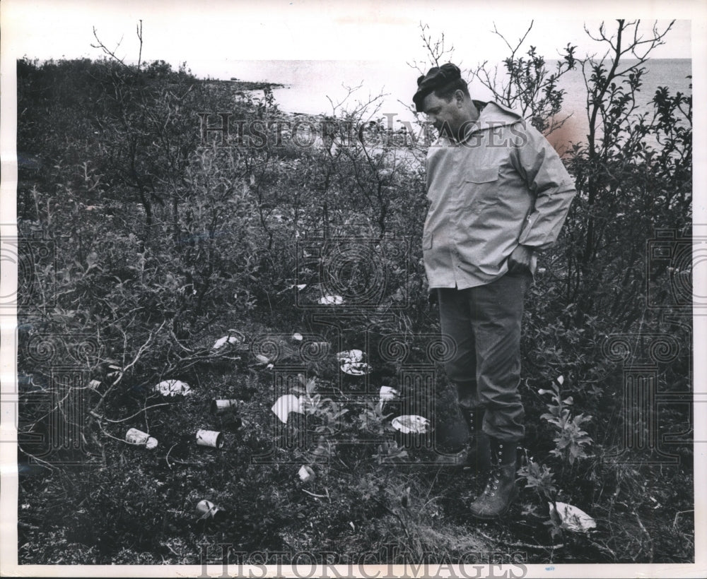 1963 Press Photo Don Johnson, litter on the shore of Great Bear Lake in Canada- Historic Images
