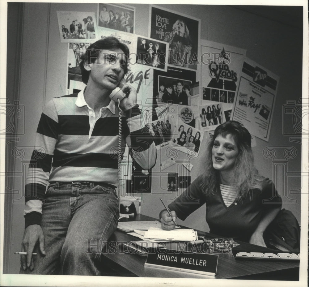1983 Richard Keepman and Monica Mueller, concert promoters. - Historic Images