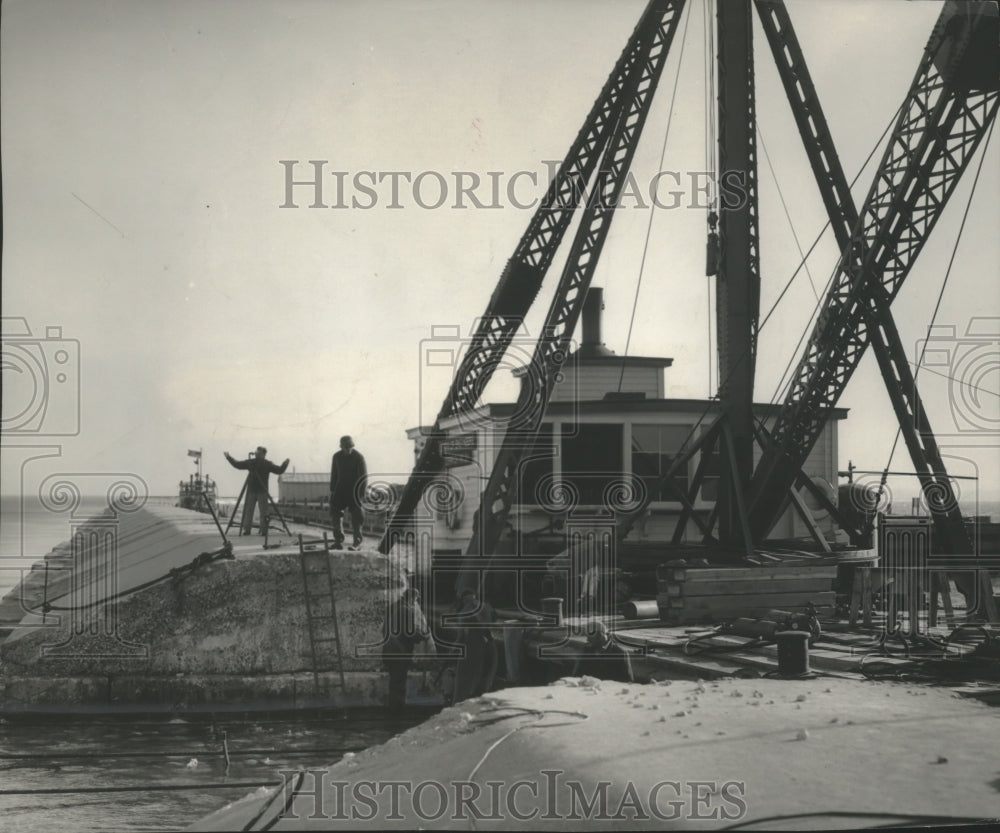 1950 Press Photo Repairs being made on Milwaukee Harbor Breakwater - mjb75427-Historic Images