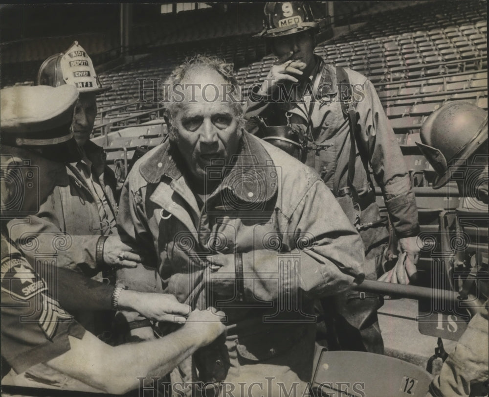 1975 Peter Reynen firemen assisted by deputy at fire, Milwaukee.-Historic Images