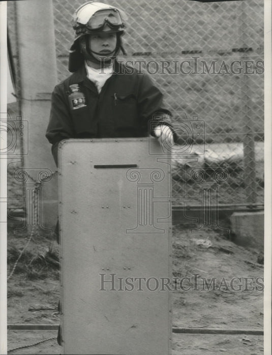 1978 A Japanese policeman outside Narita airport control tower-Historic Images