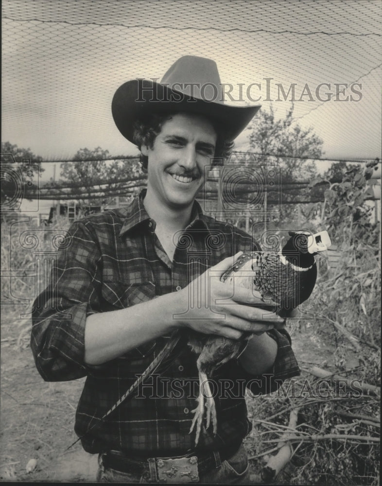 1984 Steven Williams with pheasant-Historic Images