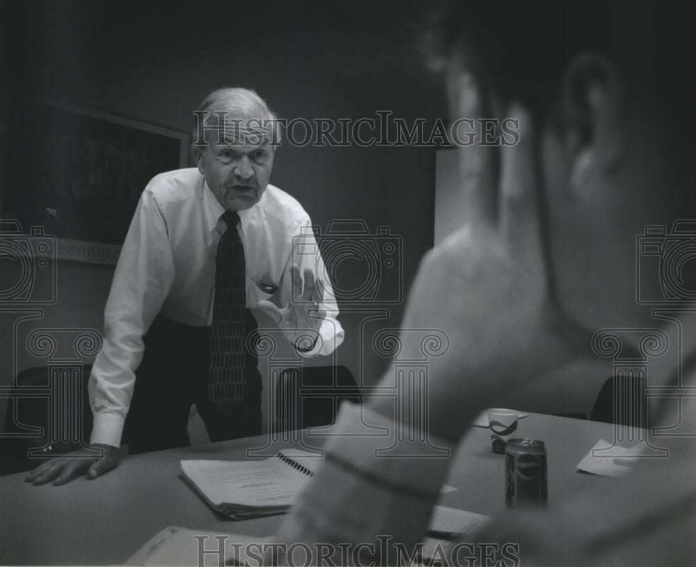 1994 Jake Jacobsen counsels people that lost jobs, Milwaukee office-Historic Images