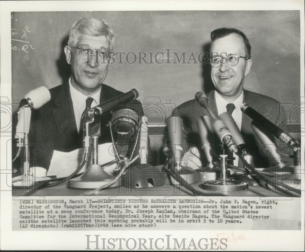 1958 Press Photo Drs. John P. Hagen and Joseph Kaplan discuss new satellite.-Historic Images
