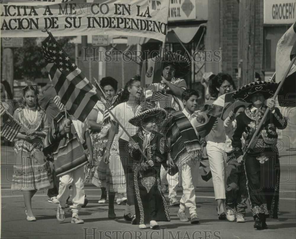 1989 Marching in the Mexican Independence Day Parade. Milwaukee-Historic Images